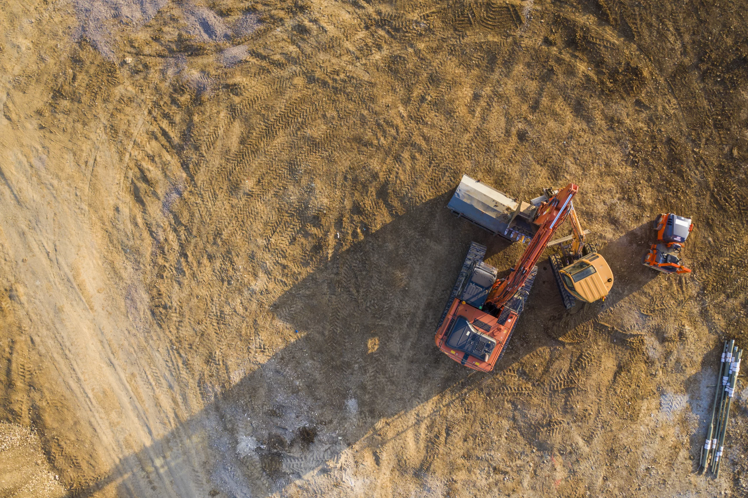 Aerial View Over Heavy Machinery On A Building Construction Site